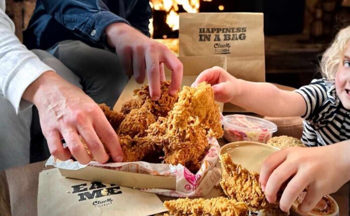 fried chicken delivery to a Calgary home with a cozy family