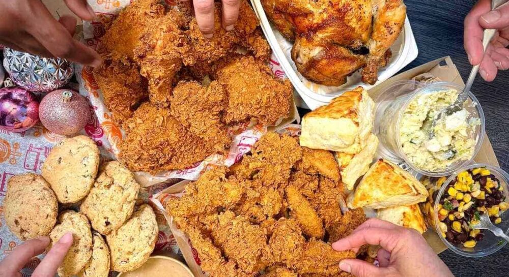 fried chicken, salads and sides catered to a family gathering