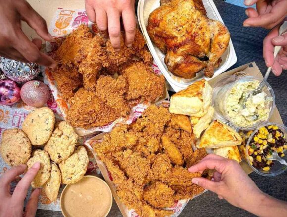 fried chicken, salads and sides catered to a family gathering